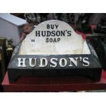 A Hudson's Soap Advertising Cast Iron Dogs Water Bowl, painted in monochrome stating "Buy Hudson's