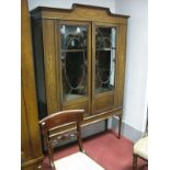An Edwardian Mahogany Display Cabinet, stepped pediment inlaid with classical swags and pendants,
