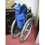 An Ex-Cel Self Propell Aluminium Folding Wheelchair.