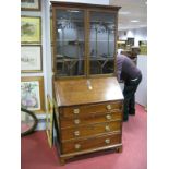 An XVIII Century Style Mahogany Bureau Bookcase, with stepped cornice, glazed astragal doors, fall