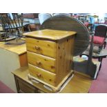 Pine Bedside Chest, with three small drawers on bun feet.