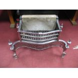 A George III Style Serpentine Shaped Polished Steel and Iron Fire Grate, the grille front and back