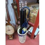 Walking Canes, umbrella, ceramic stick stand.