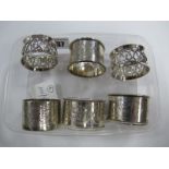 A Pair of Hallmarked Silver Napkin Rings, each with floral detail, together with assorted other