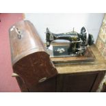 Early XX Century Sewing Machine, having inlaid inch scale to walnut casing.