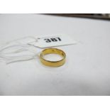 A Plain Wedding Band, indistinct hallmark for 22ct gold.