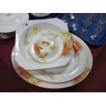 A Shelley Yellow Iris Pickle Dish, with cover, two oval meat plates and bowl. Painted No. 12382.