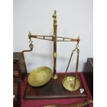 XIX Century Brass Weighing Scales (stamped Ruban Sutcliffe Manchester) on a mahogany base with a