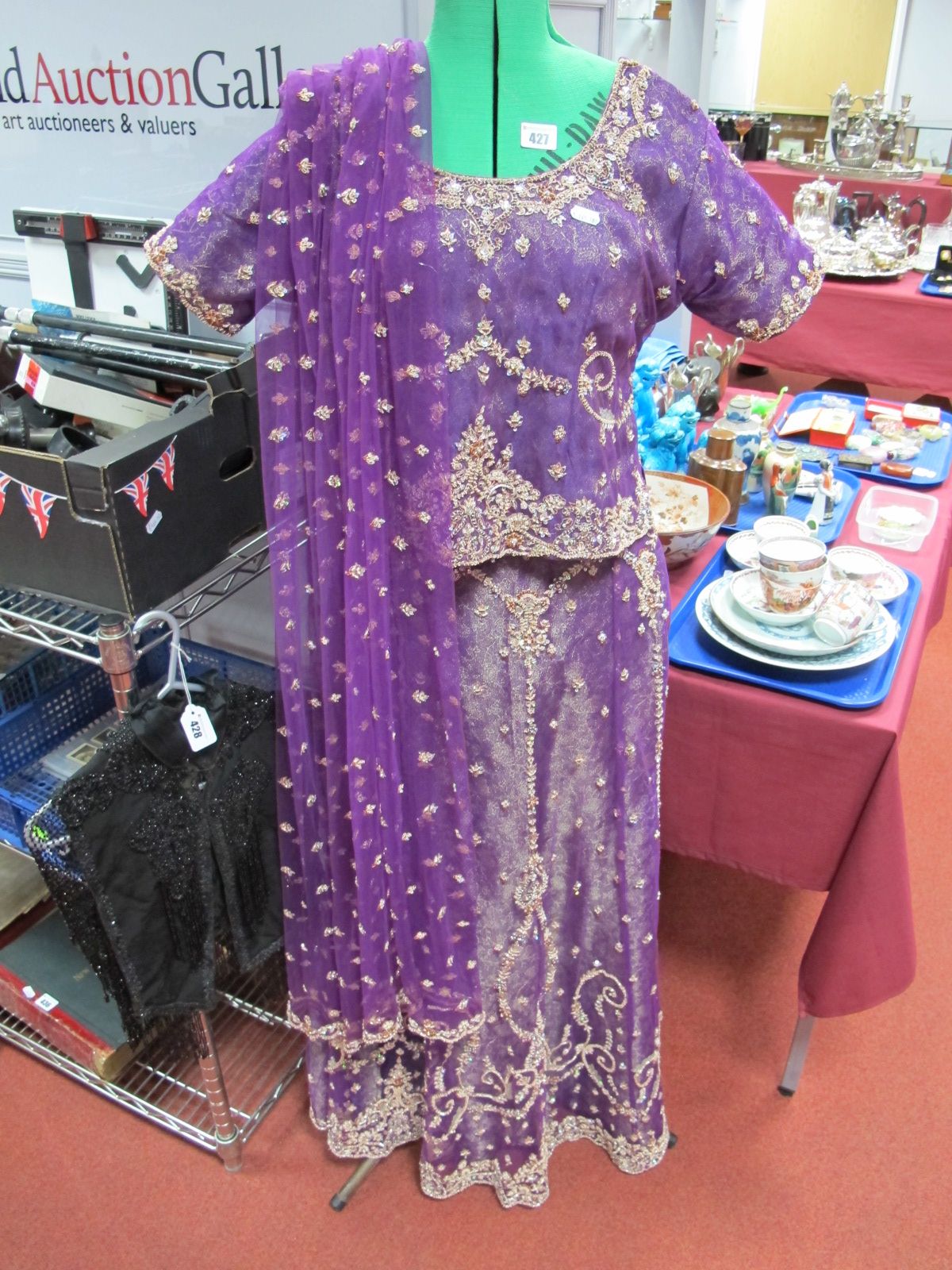 An Indian Lady's Three Piece Bridal Gown, decoratively embellished with thread and sequins.