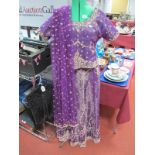 An Indian Lady's Three Piece Bridal Gown, decoratively embellished with thread and sequins.