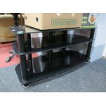 Black Glass and Silvered Metal TV Stand.