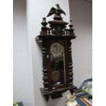 An Early XX Century Mahogany Cased Eight Day Vienna Wall Clock, the pediment with eagle crest over