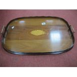 An Edwardian Mahogany Oval Shaped Tray, with a shell inlay, twin brass handles.