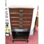 A Late XIX Century Music Cabinet, having Art Nouveau iron handles to Stone's Patent five drawers.