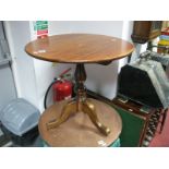 A XIX Century Pedestal Table, with a circular top, turned pedestal cabriole legs, together with a