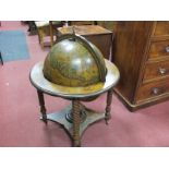 A Circa 1980's 'Kitch' Drinks Globe, with applied terrestrial design, flip top lid with fitted