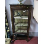 An Edwardian Mahogany Display Cabinet, with a moulded edge, freeze with painted decoration glazed