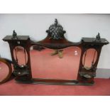 An Edwardian Mahogany Over Mantel Mirror, carved and pierced scrolling pediment above a central