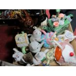 Twelve Various Novelty Teapots; horn coat hanger:- One Tray