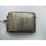 A Hallmarked Silver Vesta Case, allover engine turned, initialled "W D T", with suspension loop.