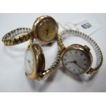 Three 9ct Gold Cased Lady's Wristwatches, each with Arabic numerals, on expanding bracelets.