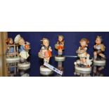 Six Hummel figures by Goebel, comprising of 'Signs of Spring', 'School Boy', 'School Girl',