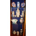 A quantity of 20th century Chinese and Japanese pottery vases and bowls,