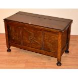 An oak blanket box, with hinged lid,