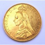 A Victorian gold two pound coin, dated 1887, 40g CONDITION REPORT: Lot 33 - 3.