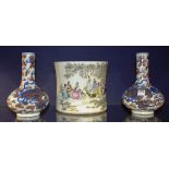 A pair of Chinese baluster shaped vases, decorated with mythical beasts on white ground, 22cm high,