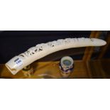 An African carved ivory elephant tusk (a/f),