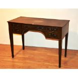 A late 19th century George III style mahogany inlaid desk,