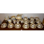 A 19th century Rockingham style porcelain tea service,