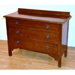 An Edwardian mahogany inlaid bedroom chest of drawers, with three graduated drawers,