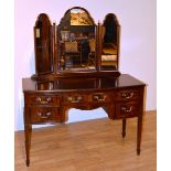 A mahogany dressing table, with tri-plate mirror, above single drawers,