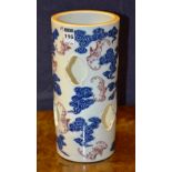 A Chinese pottery wig stand, of cylinder shape,
