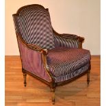 A good quality Victorian style drawing room armchair,