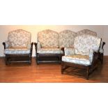 An Ercol lounge suite, comprising of settee and pair of matching armchairs,