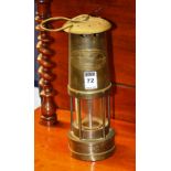 A vintage miners safety lamp, by E Thomas & Williams, Aberdare,