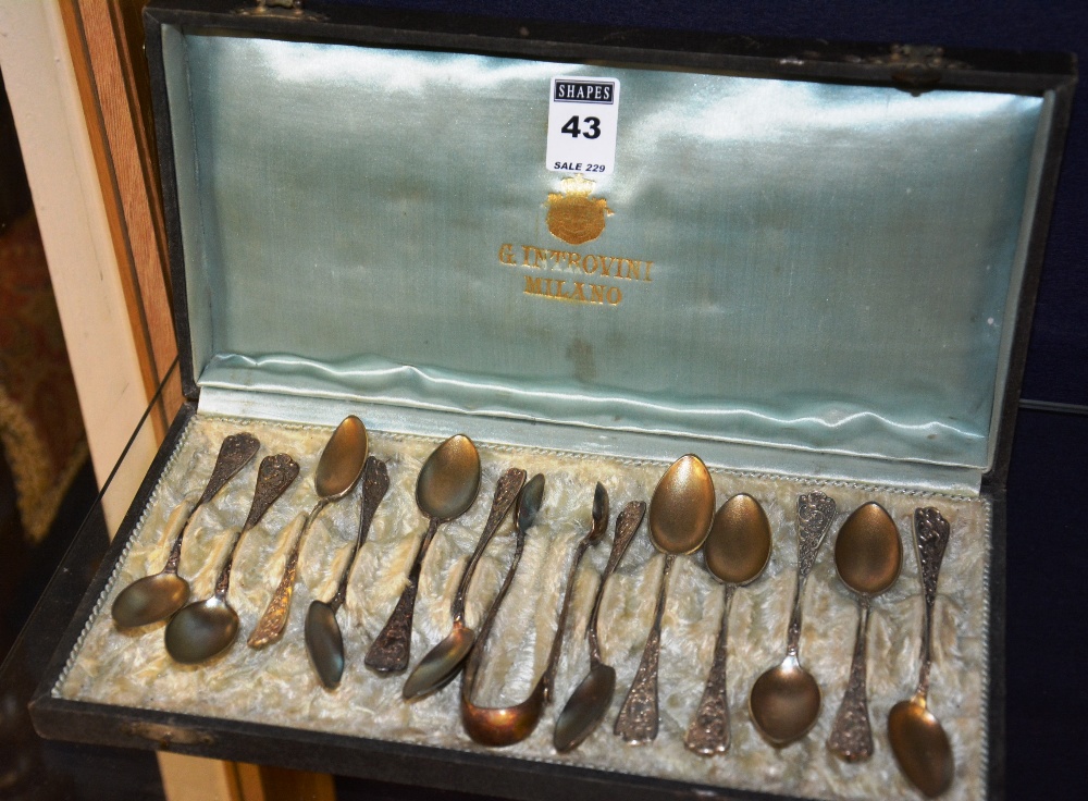 A set of 12 Italian silver teaspoons and tongs, stamped 800 to reverse, approx 2 ozt,