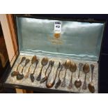 A set of 12 Italian silver teaspoons and tongs, stamped 800 to reverse, approx 2 ozt,
