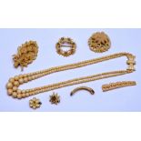 A small collection of ivory and faux ivory jewellery,