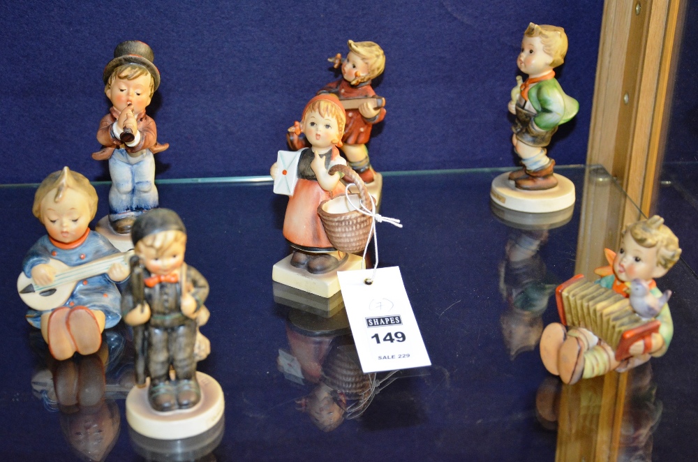 Seven Hummel figures by Goebel, comprising of 'Lets Sing', 'Serenade', 'Happiness', 'Joyful',