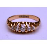 A gold five stone diamond ring,