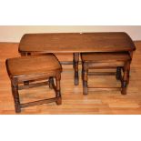 An Ercol Long John nest of three tables,