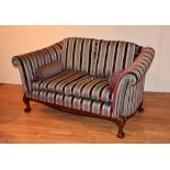 A good quality Regency style two seater settee, upholstered in red and gold striped dralon,