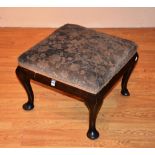 A mahogany pad foot dressing stool, with floral upholstered top,