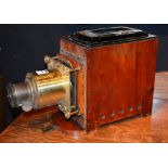 A vintage magic lantern, 29cm high x 46cm long,