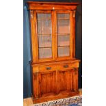 A Victorian mahogany bookcase, on cupboard base,