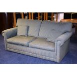 A fabric upholstered two seater bed settee,